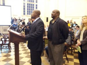 Batts speaking before Hartford City Council.