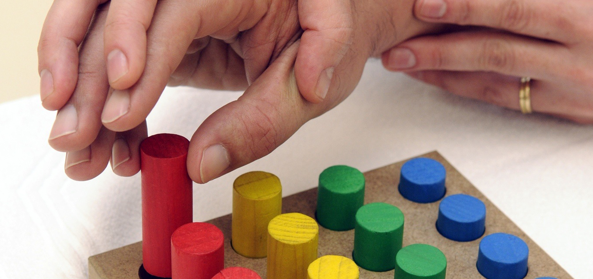 an occupational therapy assistant working with a patient