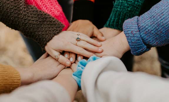 all hands in a circle